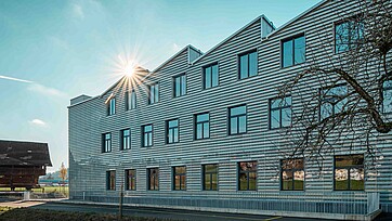 Stagebild, Aussenansicht des neuen Gebäudes der Lanz-Anliker AG in Rohrbach