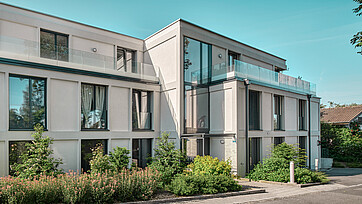 Aussenaufnahme des Mehrfamilienhauses Eleganza in Ostermundigen, ausgestattet mit Holz/Aluminium-Fenstern EgoSelection