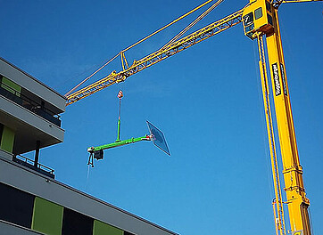 Changement de verre avec une grue