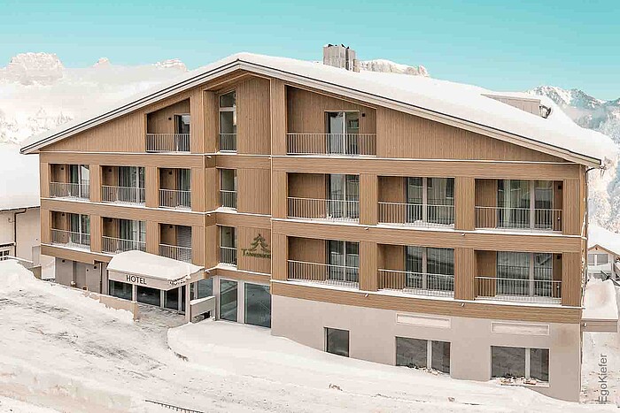 Foto esterna del nuovo edificio sostitutivo dell'Hotel Tannenboden, Flumserberg, atmosfera invernale