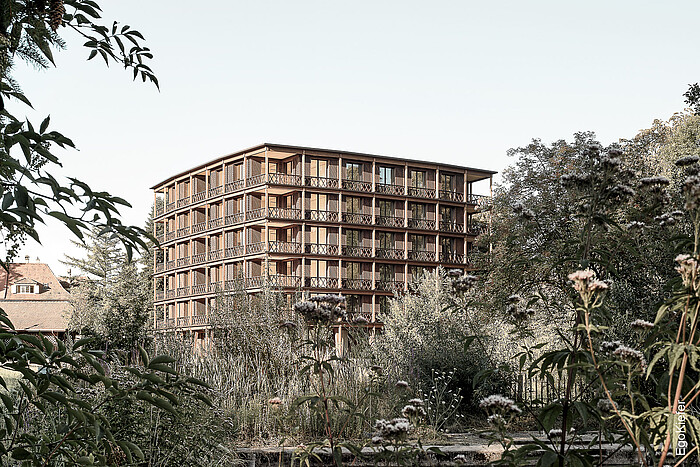 Foto dell'esterno del condominio “Francesco” nel giardino dei Cappuccini del convento di Wesemlin a Lucerna. Sono state installate finestre in legno/alluminio EgoKiefer.