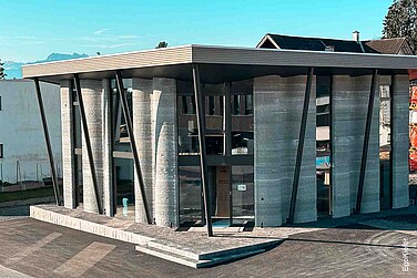 Aussenansicht des ersten Gebäudes, das vollständig mittels 3D-Betondruck realisiert wurde.